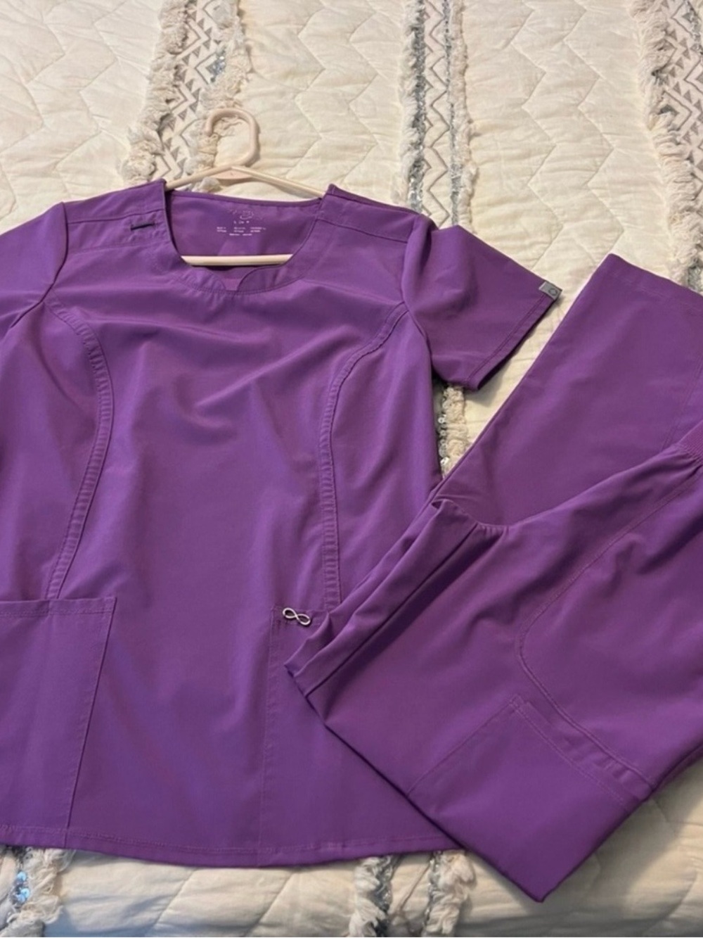 5 sets of scrub Top & Pants Sets and 2 scrub tops. Worn only a couple of times